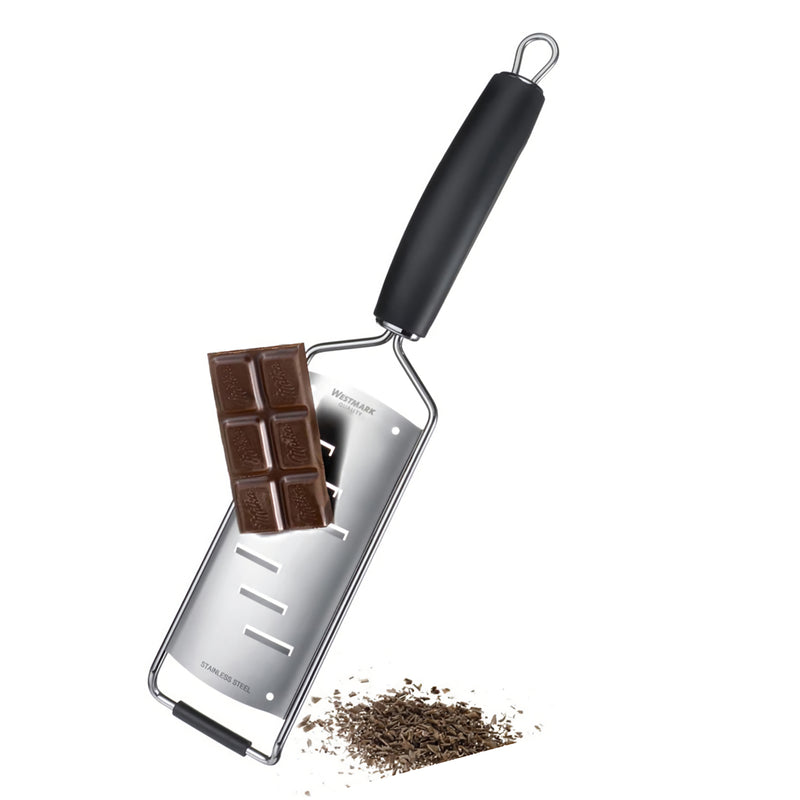 Westmark Mikroteräraastin raastamassa suklaata – tarkka ja terävä raastin soveltuu erinomaisesti suklaan, juuston ja vihannesten raastamiseen.