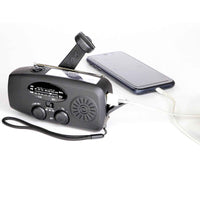 Trek ladattava radio - Hätäradio USB-latauksella, kampilaturilla ja taskulampulla, lataa älypuhelinta retkillä tai hätätilanteissa.