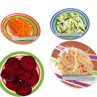 Värikkäitä vihannesviipaleita ja -suikaleita Super Benriner Mandoliinilla leikattuna. Täydellinen salaattien ja koristeiden valmistukseen.