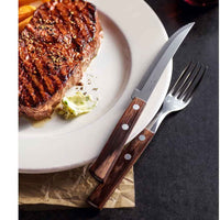 Tramontina Churrasco aterimet ja grillattu pihvi lautasella