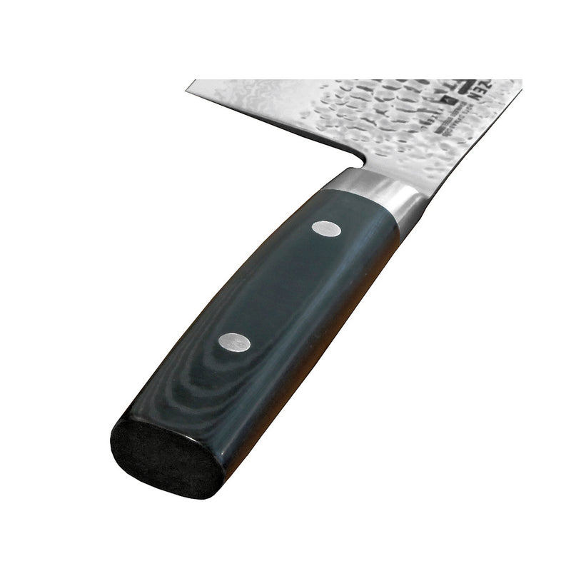 Close-up of Yaxell Zen Japanese chef's knife handle and partial blade, showcasing craftsmanship and durable handle design.