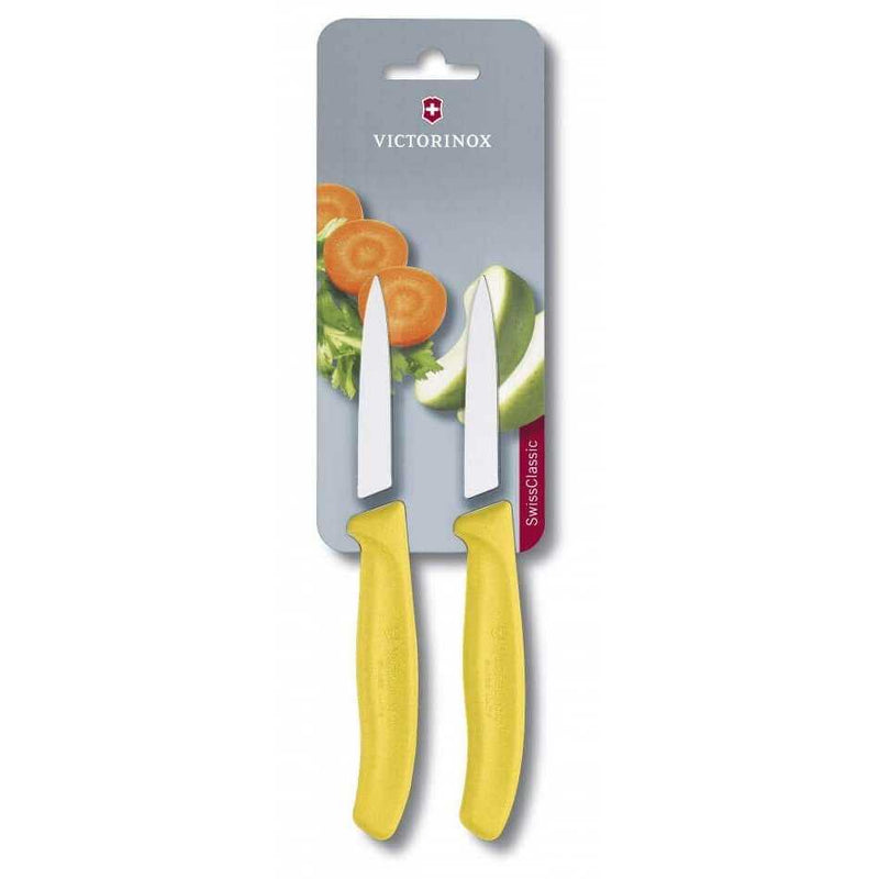 Victorinox Kuorimaveitsi Setti - 8 cm, 2 kpl Swiss Classic keltaisella kahvalla, vihanneskuvituksella varustetussa pakkauksessa.