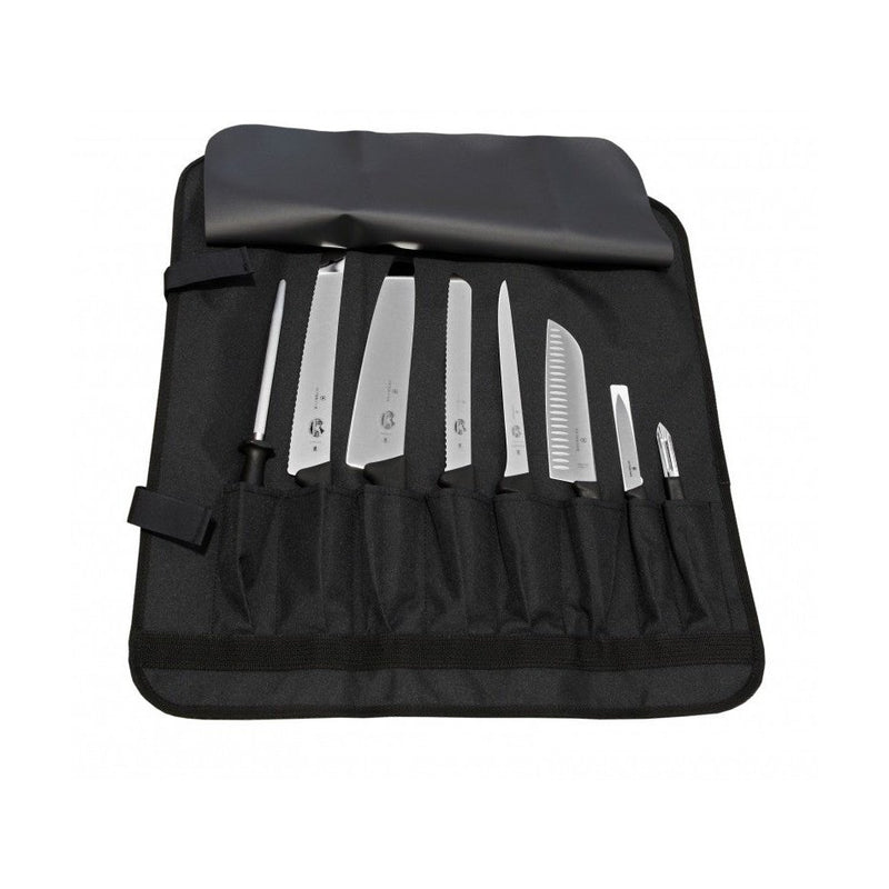 Täyteen ladattu veitsilaukku 8 veitselle, sisältää erilaisia keittiöveitsiä ja teroitustikun, järjestettynä mustiin taskuihin.
