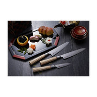 Suncraft Senzo Damascus veitsisarja, japanilaiset kokkiveitset, tyylikäs kattaus ja tarkkuusleikkaus.