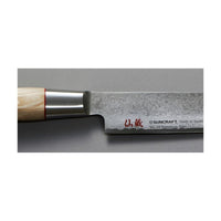 Lähikuva Suncraft Senzo Sashimiveitsen Damascusterästä ja VG10 ytimestä, japanilainen laatu.