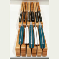 Arcos veitsiteline, veitsien järjestely vetolaatikossa